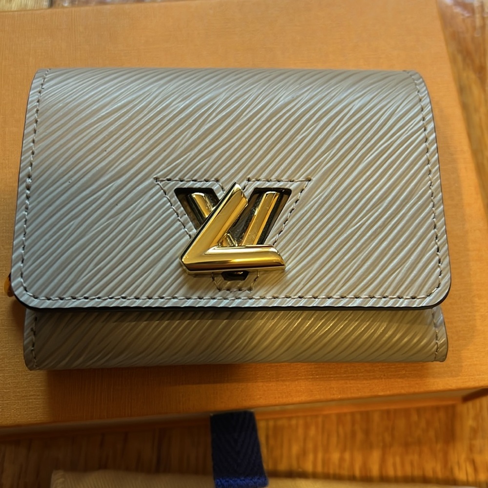 Louis Vuitton Epi Twist Compact Wallet Galet (gray beige) with gold twist lock